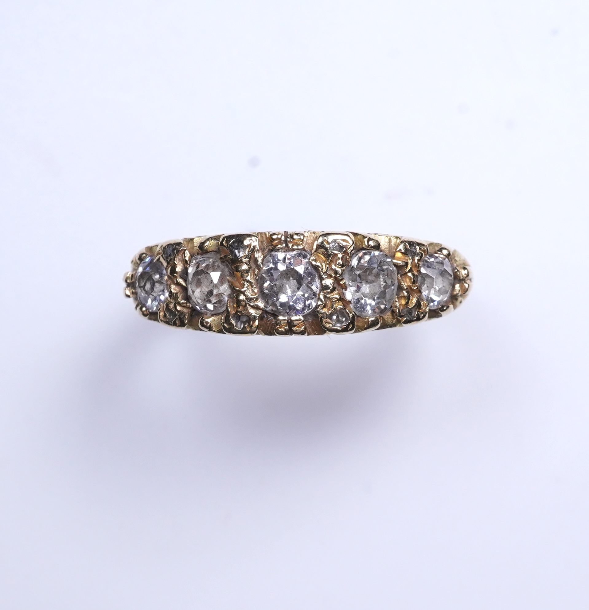 An 18ct gold five-stone diamond ring